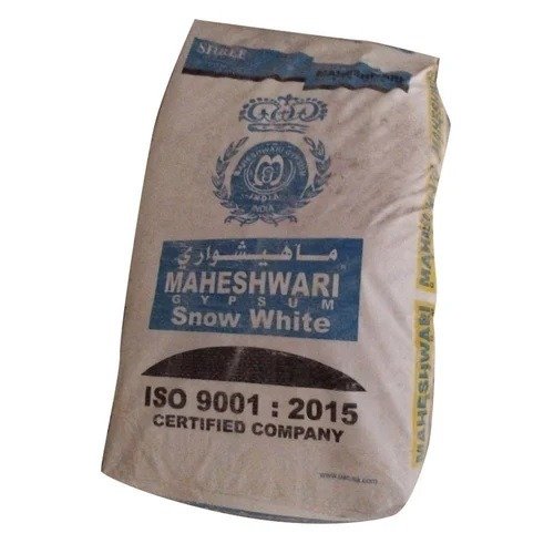 A single white sack of Maheshwari Gypsum Snow White plaster isolated on a plain white background, highlighting blue branding text and ISO 9001:2015 certification.