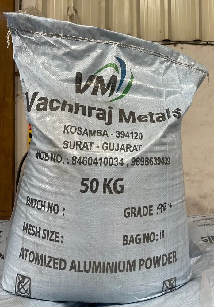A 50 kg woven sack of Atomized Aluminium Powder manufactured by Vachhraj Metals, displaying company branding, location details, and grade specifications.